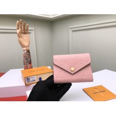 Louis Vuitton Victorine Wallet Monogram Empreinte Leather in Pink