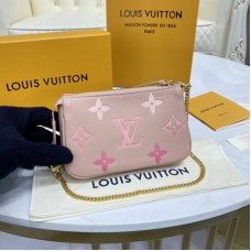 Louis Vuitton Mini Pochette Accessoires Monogram Empreinte Leather in Rose